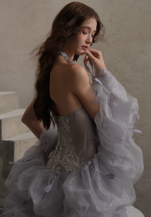 Back of Convertible Beaded Strapless Wedding Dress with Detachable Sleeves & Train