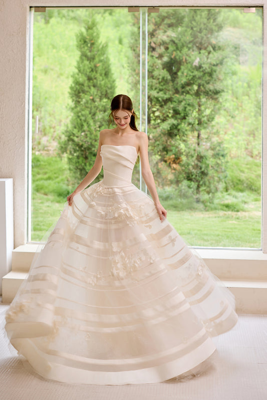 Floral strapless A-line wedding dress with 3D flower appliqués and flowing train