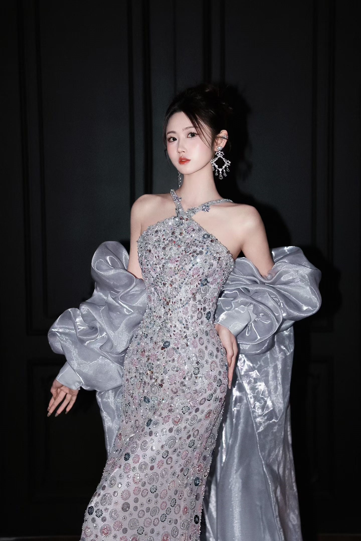 Intricate crystal and gemstone beadwork on a couture halter sheath wedding dress