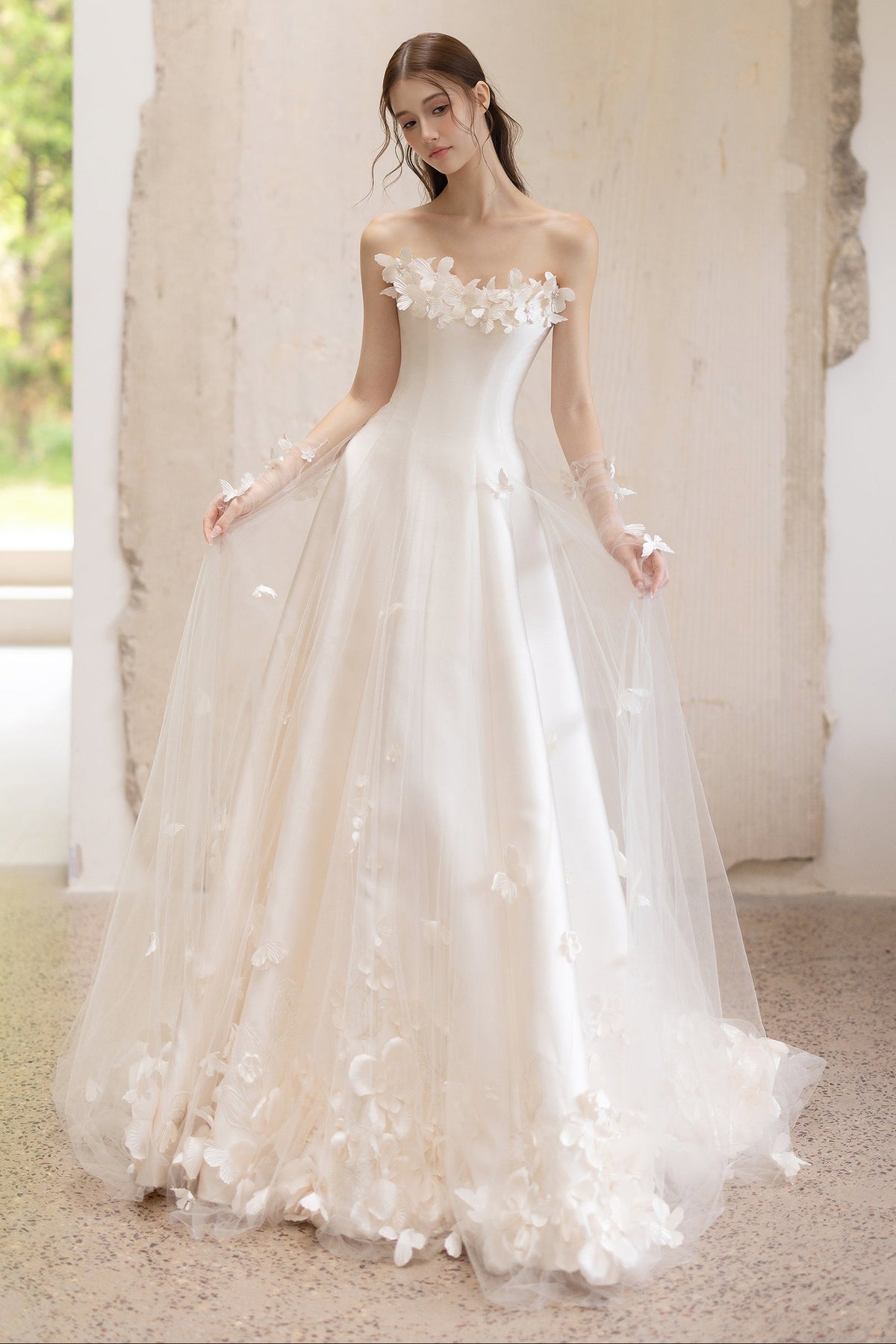 Ivory A-line wedding dress with strapless bodice, 3D floral neckline and romantic tulle skirt