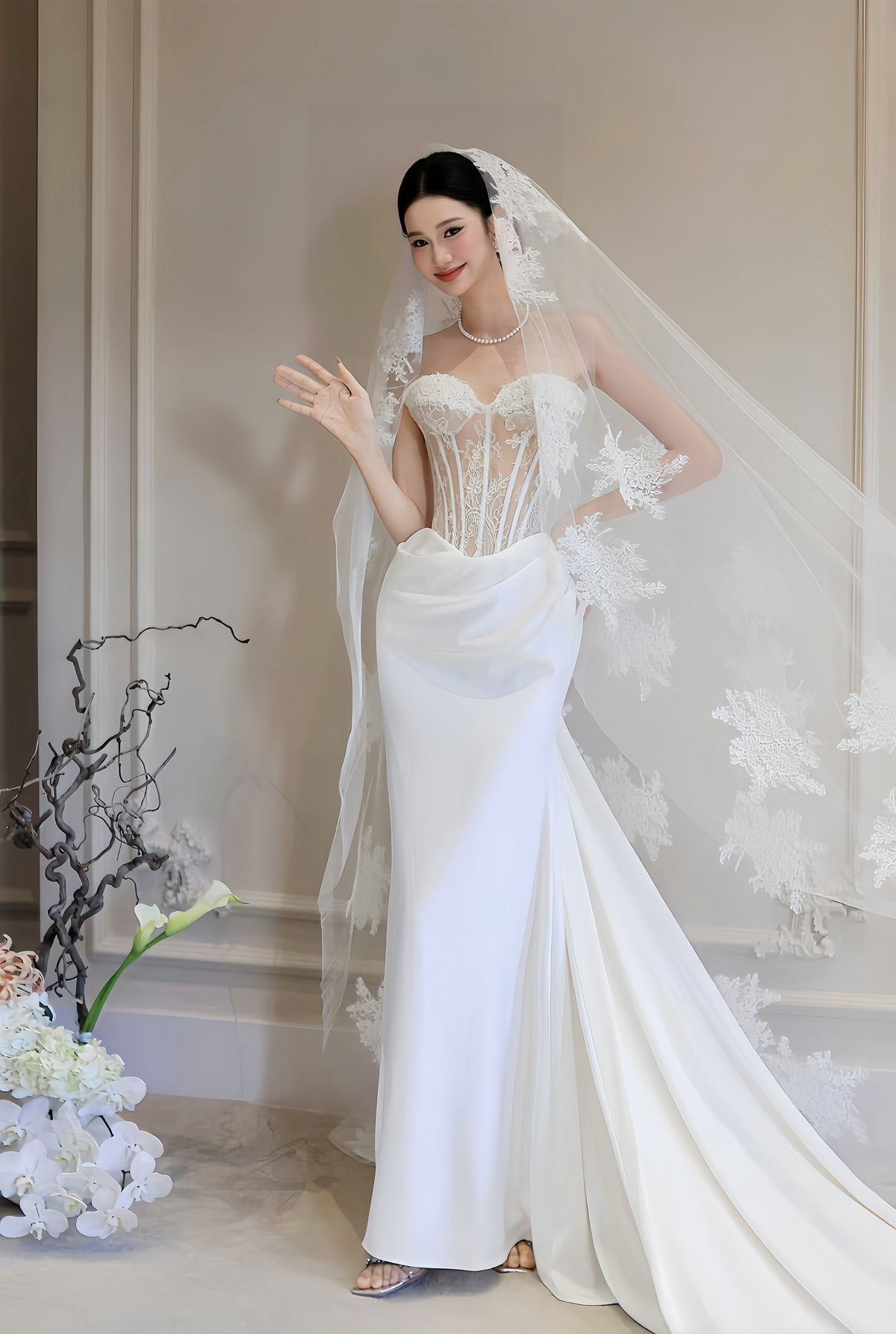 Luxury lace corset sheath wedding dress with sweetheart neckline, sheer boned bodice, draped skirt and Cathedral Veil
