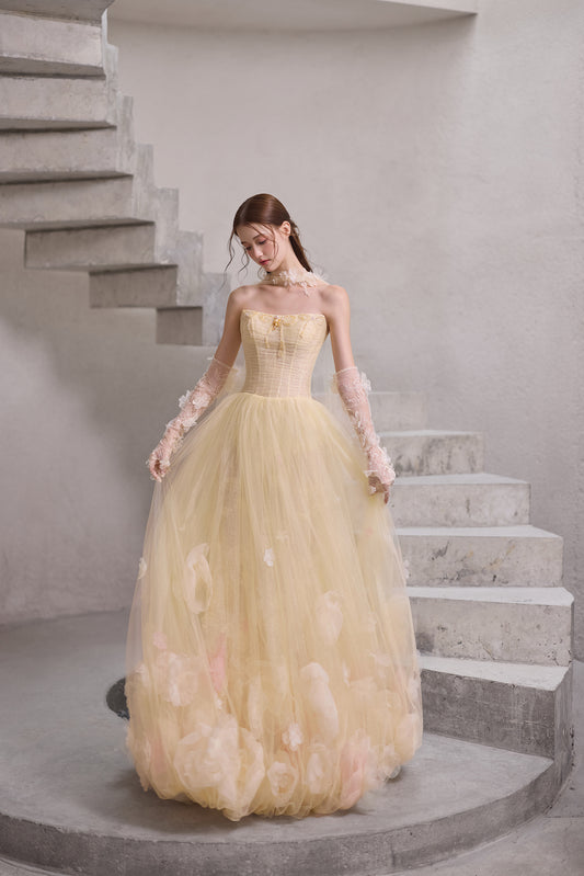 Romantic butter yellow A-line wedding dress with strapless corset bodice, tulle skirt and 3D floral details