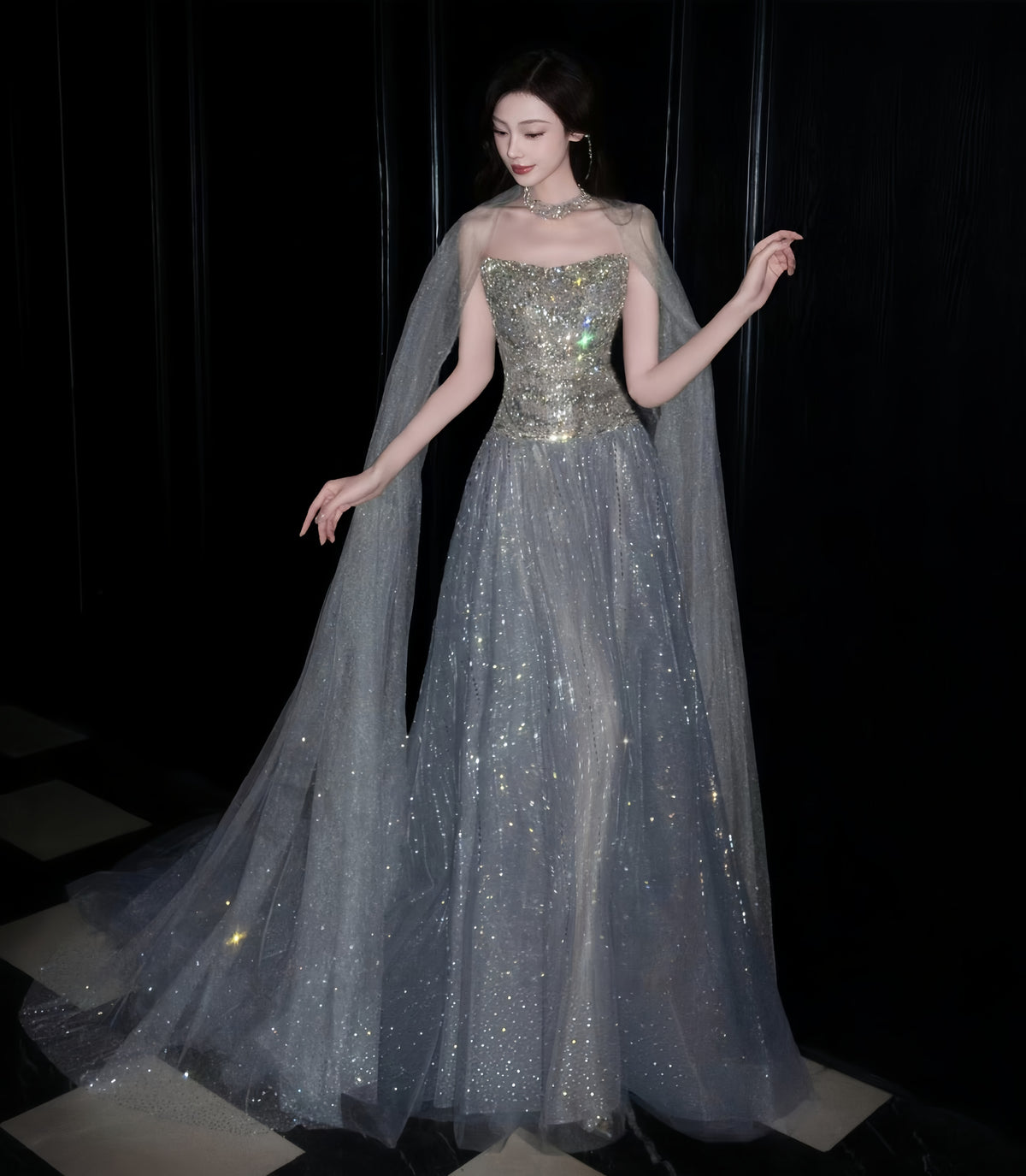Silver crystal beaded A-line prom dress with glitter tulle skirt and flowing cape