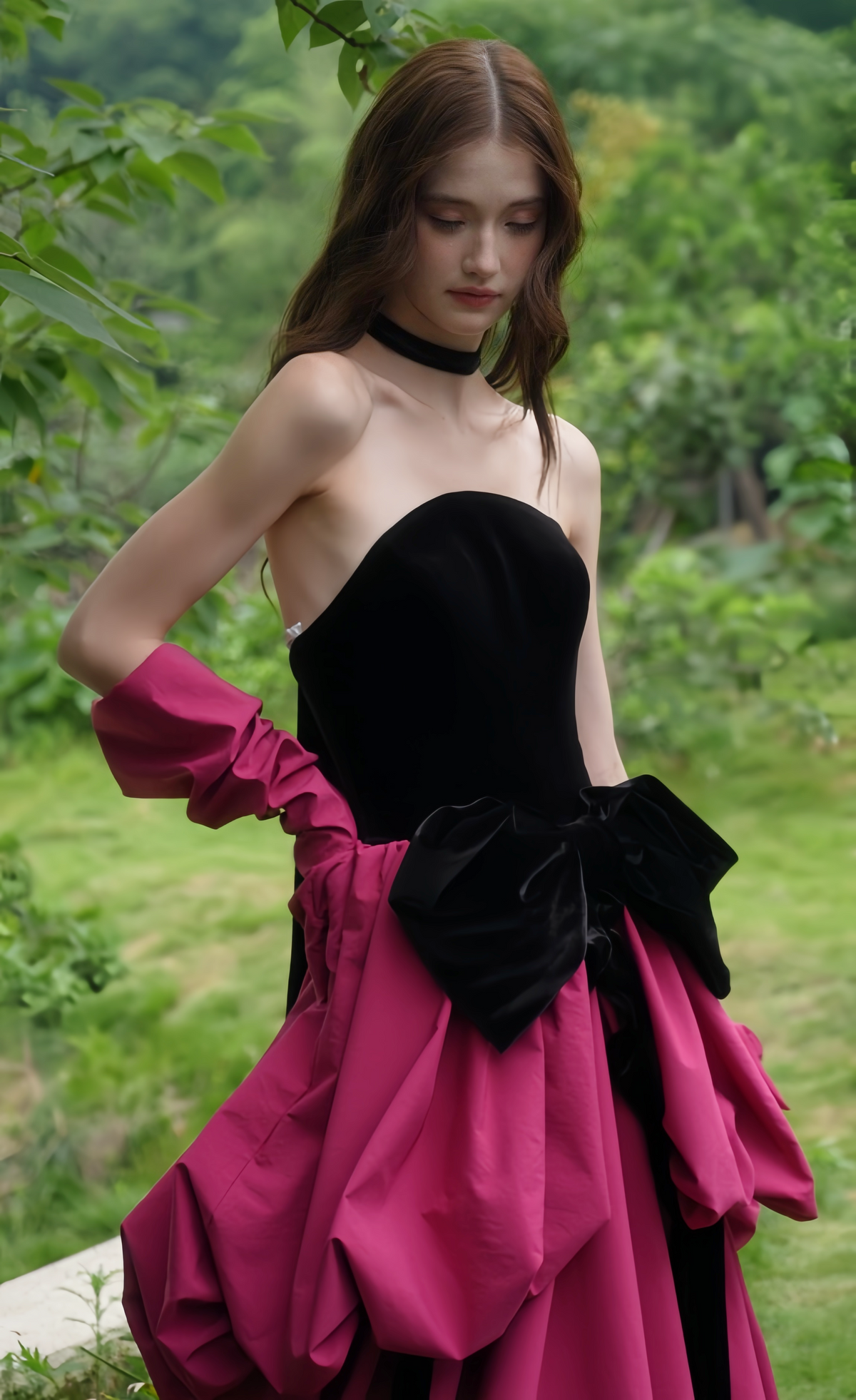 Strapless neckline and sculptural waist design