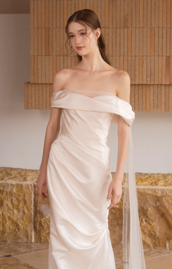 Top View of satin bodice and off-the-shoulder neckline on a minimalist wedding dress