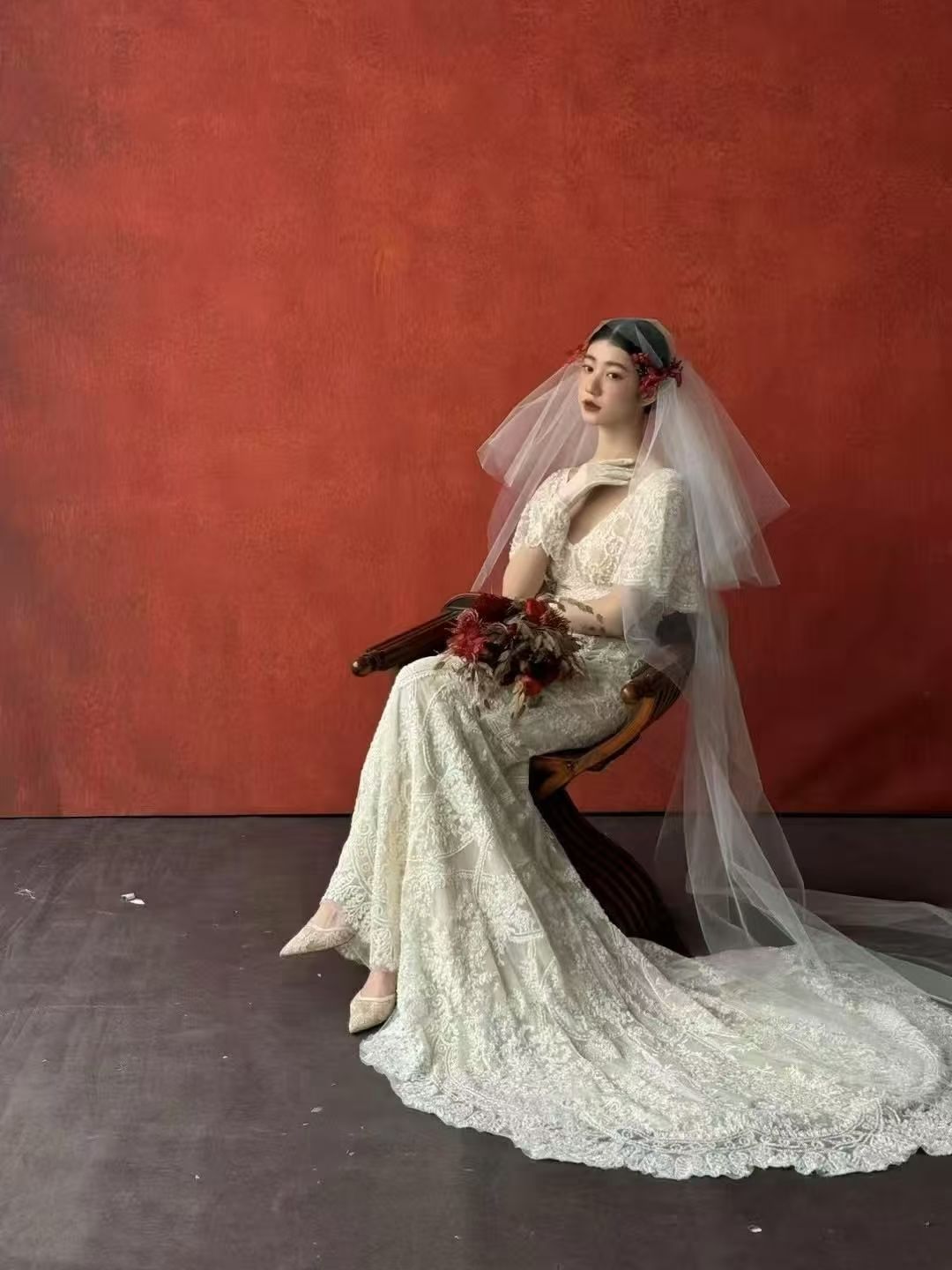 Vintage ivory lace mermaid wedding dress with short sleeves and dramatic chapel train