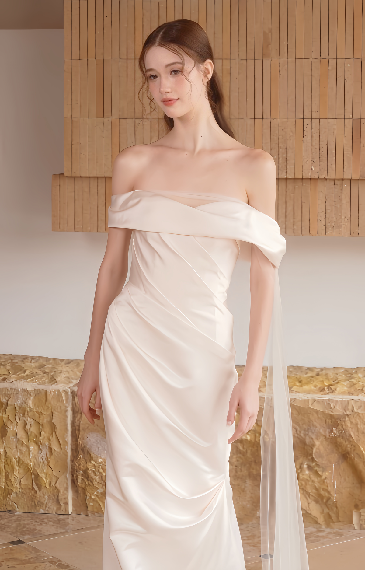 Front view of satin bodice and off-the-shoulder neckline on a minimalist wedding dress